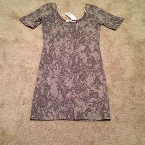 Forever 21 mini body hugging dress. Lace print