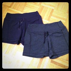 Two pairs size 4 lululemon shorts blue and grey