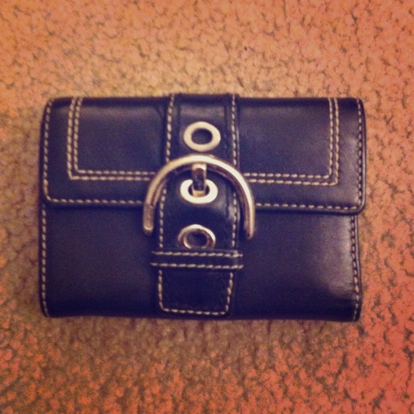 Coach black tri-fold wallet :) 🍰