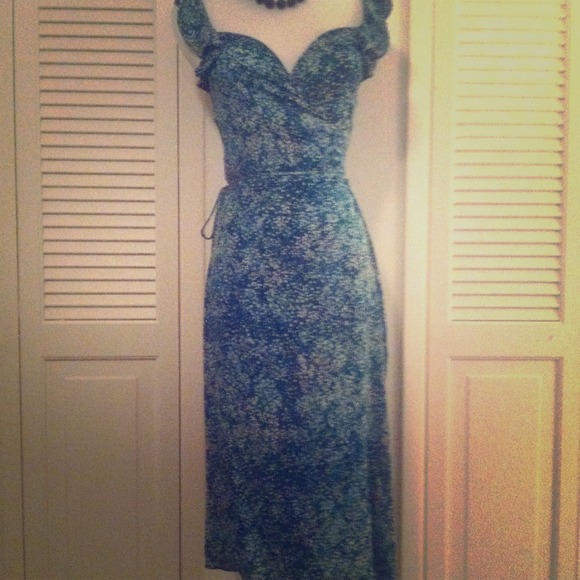 Elegant Silk Sleeveless Wraparound Dress