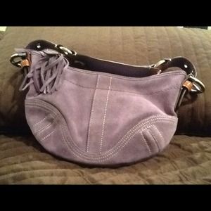 Gently used authentic Coach purse.  Lavender suede