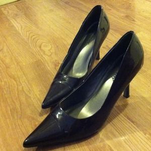 Dark brown patent pumps