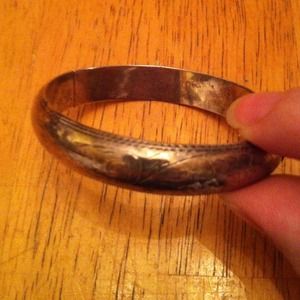 Sterling bangle- opens and closes with a catch