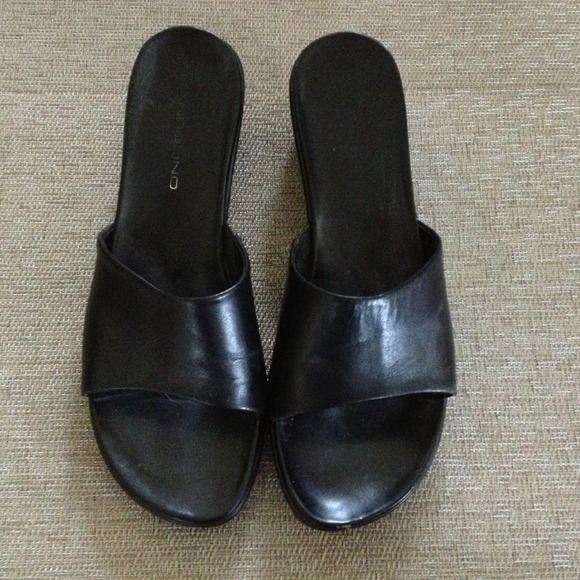 Bandolino black leather slight wedge sandal.