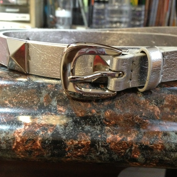 Michael Kors silver studded belt.