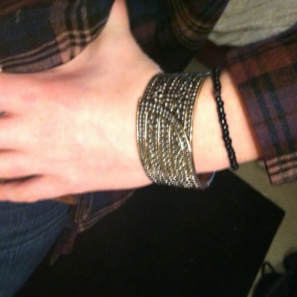 Silver with gold accented cuff.