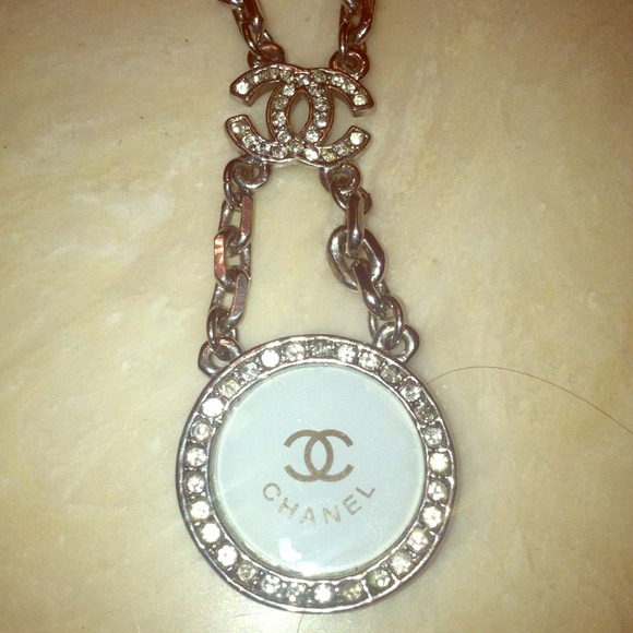Chanel necklace ad ring set!