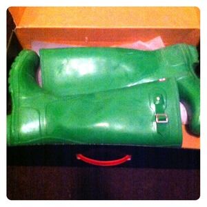 Green hunter rain boots.