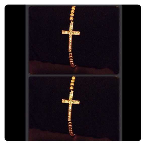 Gold color sideways stretchy cross bracelet
