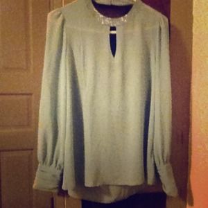 Never worn beautiful blue sheer long sleeve top