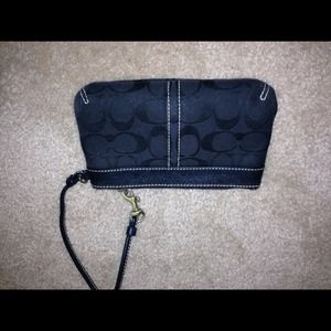 Black coach wristlet.