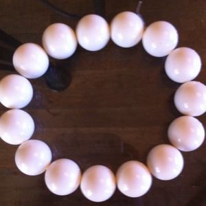 White plastic pearl bracelet