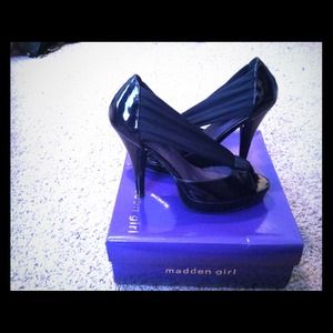 Dressy black patent leather shoe