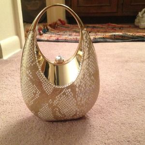 Beautiful gold party clutch with crystals..