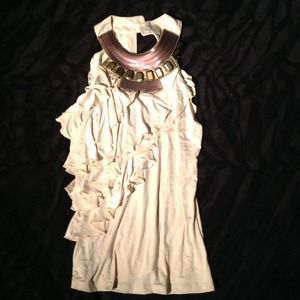 Tan halter with beads around neck