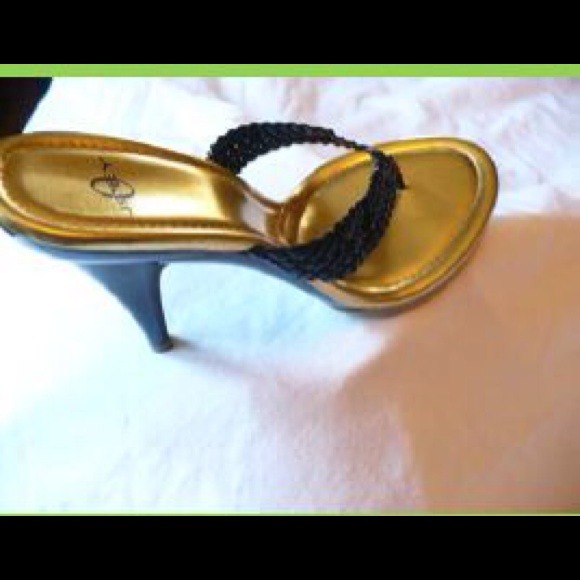 Brand new pair of black and gold Joey heels