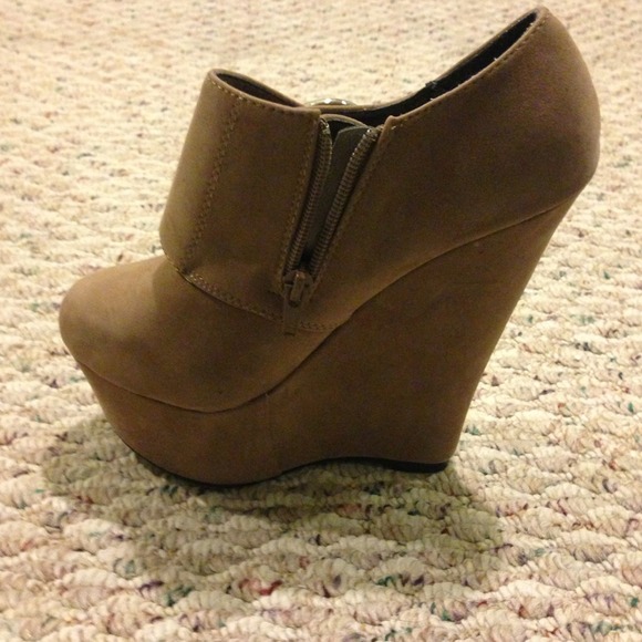 Beige buckle wedge booties