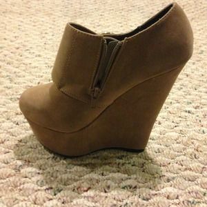 Beige buckle wedge booties