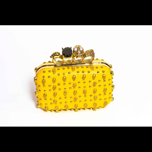 Studded knuckle duster skull clutch