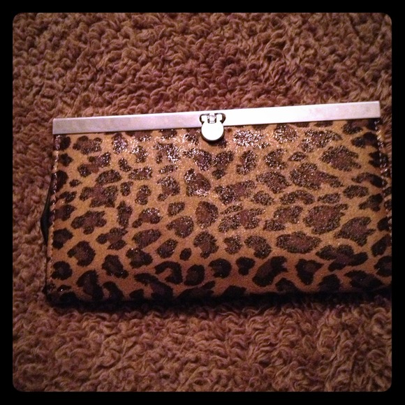 Cheetah clutch. Kinda shiny. See description.