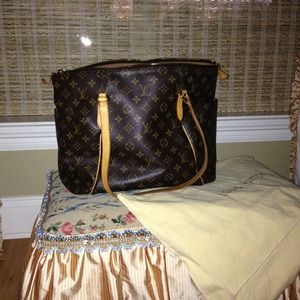 Totally MM. Louis Vuitton.