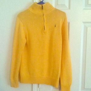 A Yellow Polo Sweater.
