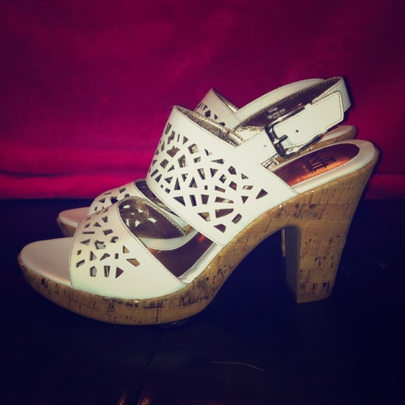 Gorgeous wedge-like heels, never been worn!