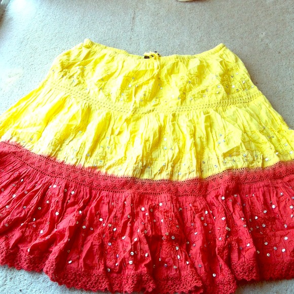 Yellow and red skirt with work