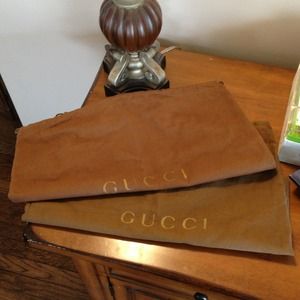 Bundled Gucci dustbags