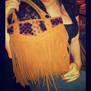 Custom made fringe purse with leather and studs