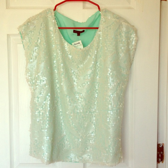 Sparkly cream and aqua top.