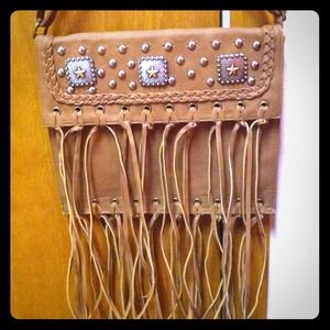 Custom made fringe bag with studs and stars
