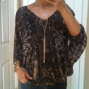 Jeans by Buffalo Snakeskin print sheer top.
