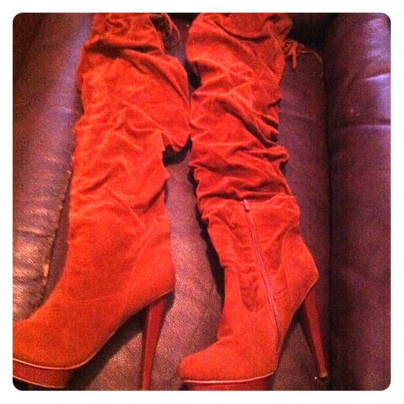 Man made thigh high boots