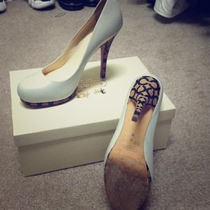 Beautiful off white Coach Pumps