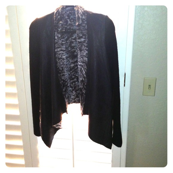 Black sweater/jacket.