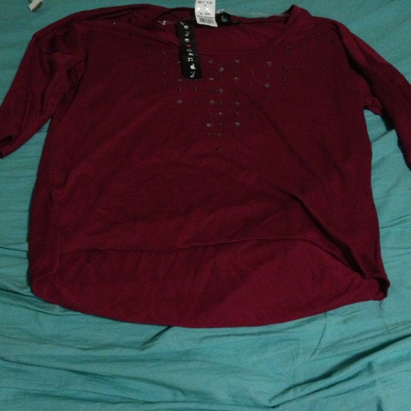 Maroon 3/4 sleeve tee with studs around neck