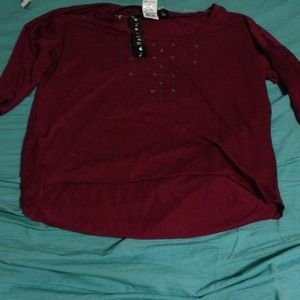 Maroon 3/4 sleeve tee with studs around neck