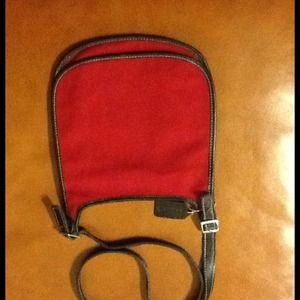 Coach red wool trimmed in black leather.