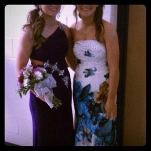 Selling prom dress shown on right.