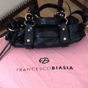 RESERVED Francesco Biasia Purse.  SOLD/traded