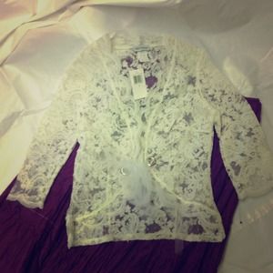 Ivory color lace cover up size sm. by Kay Celine