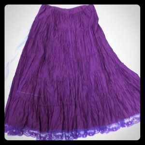 Long ruffled purple skirt with lace trim by Angie