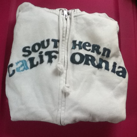 White Hollister jacket with blue writing