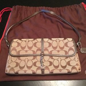 Authentic Coach small brown signature purse.