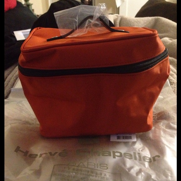Sold**Herve Champlier deep orange vanity case