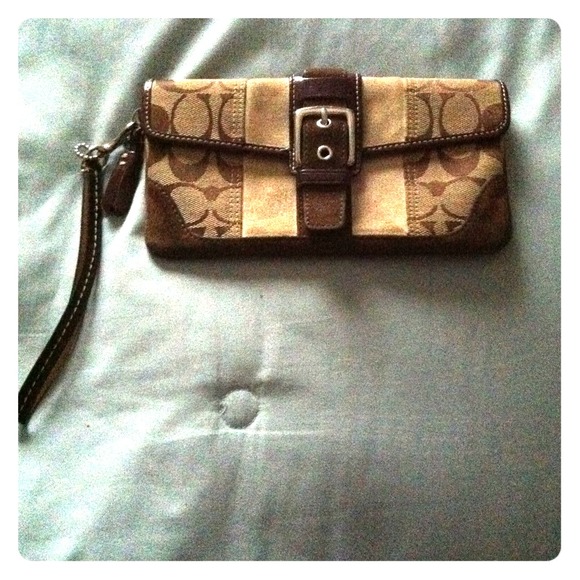 Reserved*****Authentic coach wristlet