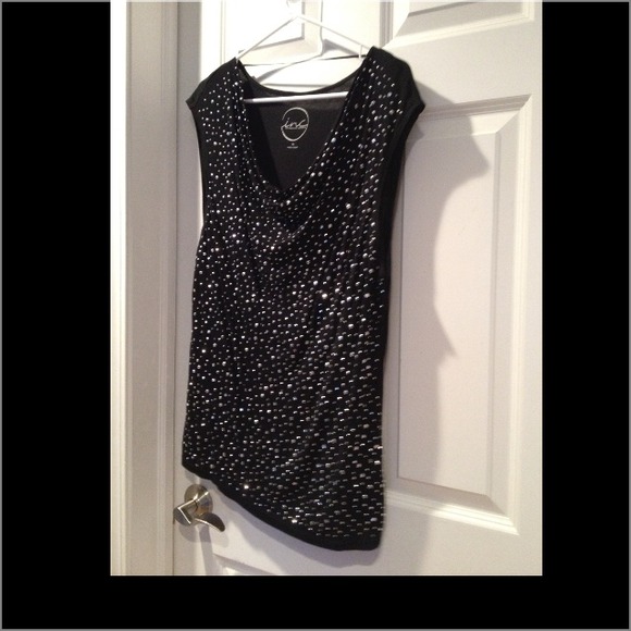 Sleeveless black embellished shirt
