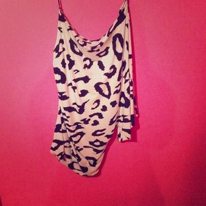 White leopard print one-shoulder dress.