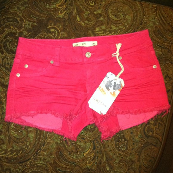 Hot Pink frayed denim shorts